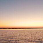 definition of real friendship sunset from boat